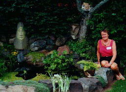 Yvonne Gallant next to their pond